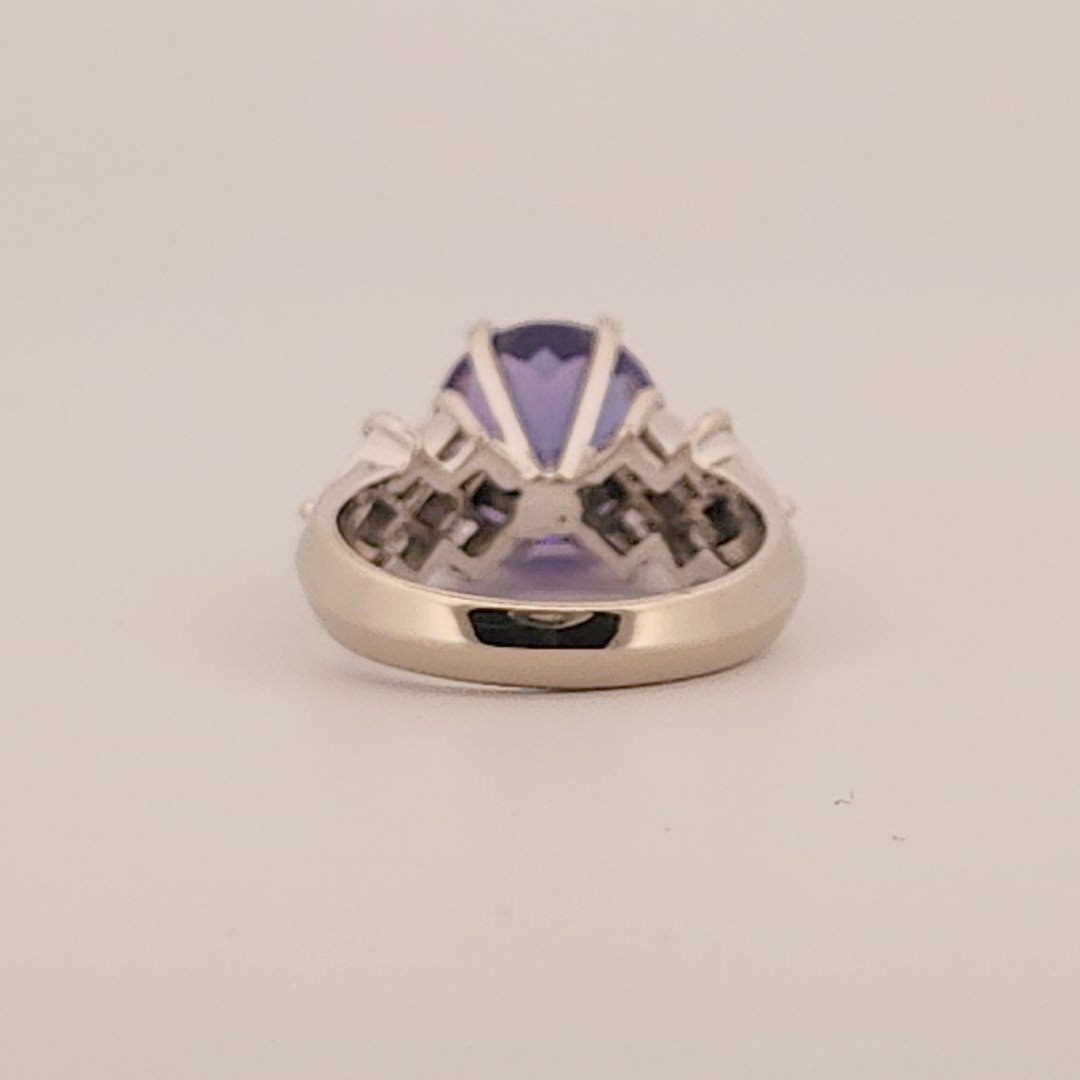 Natural Round Modified Brilliant Cut, Bluish Violet Tanzanite (5.25 CT - 10.20 mm) with 12 Natural Princess cut 3x3 mm Square Diamonds (1.92 CTW) Ring 14K White Gold. GIA Certified (2231466864).