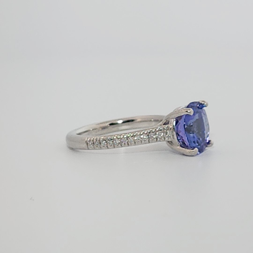 Modified Brilliant Cut, Round Shape, Bluish Violet Tanzanite (2.80CT, 8.89 - 9.01 x 5.53 mm), Mounted at Platinum 950 ring with Natural Diamonds (0.18 CTW E/F-SI). GIA Certified (5231466569). Size 5.25