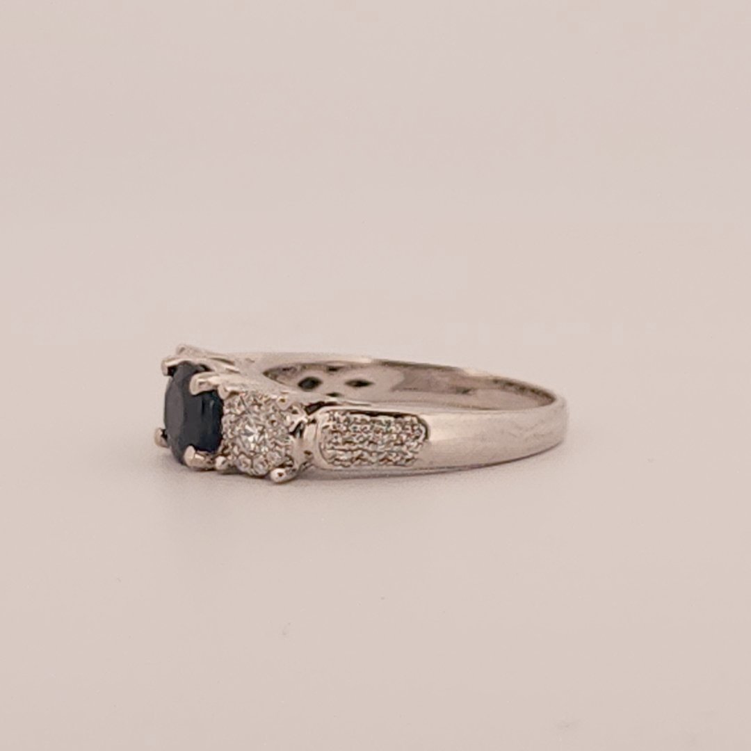 Three stone style Bridal Ring with 0.75 CT Natural Sapphire and 0.34CTW Natural Diamonds