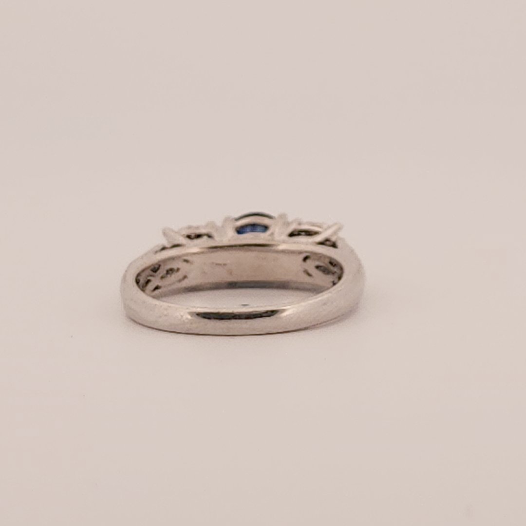 Three stone style Bridal Ring with 0.75 CT Natural Sapphire and 0.34CTW Natural Diamonds