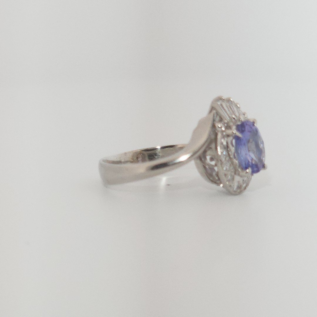 Oval Faceted, AAA, Natural Tanzanite (1.15CT, 8x6mm), Mounted on Platinum 900 Ring with Natural Diamonds (0.35 CTW, E/F-VS). Size 6
