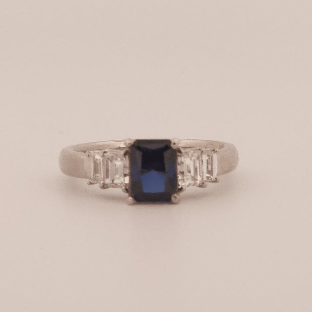 Emerald Step-Cut, AAA Natural Blue Sapphire (1.15CT, 7x5mm), Mounted on Platinum 900 Ring with Natural Diamonds (0.77 CTW, E/F VS1/VS2). Size 7.25