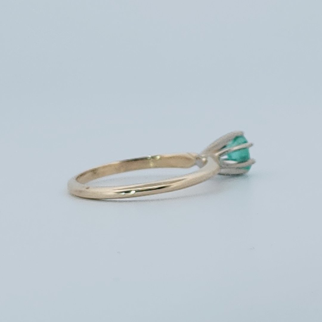 Step Emerald Cut,  Natural Columbian Emerald(0.30CT, 4.65x3.55mm), Mounted on 14K White Gold Prongs and 14K Yellow Gold Shank. Size 6