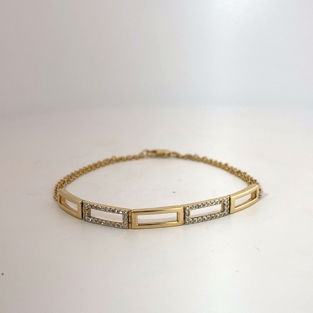 Female Geometric Bracelet, 14K Yellow Gold with diamond accents totaling 0.24ct.