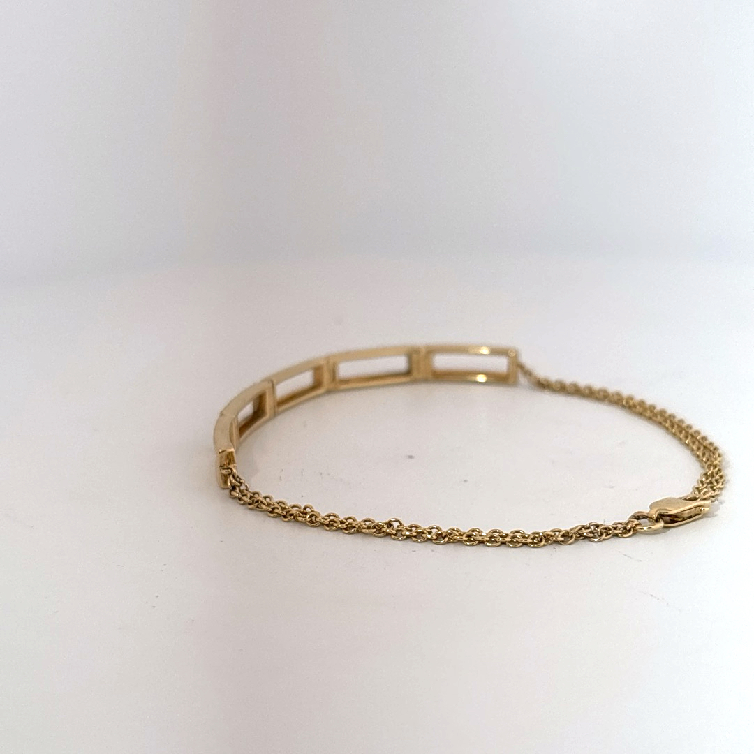 Female Geometric Bracelet, 14K Yellow Gold with diamond accents totaling 0.24ct.