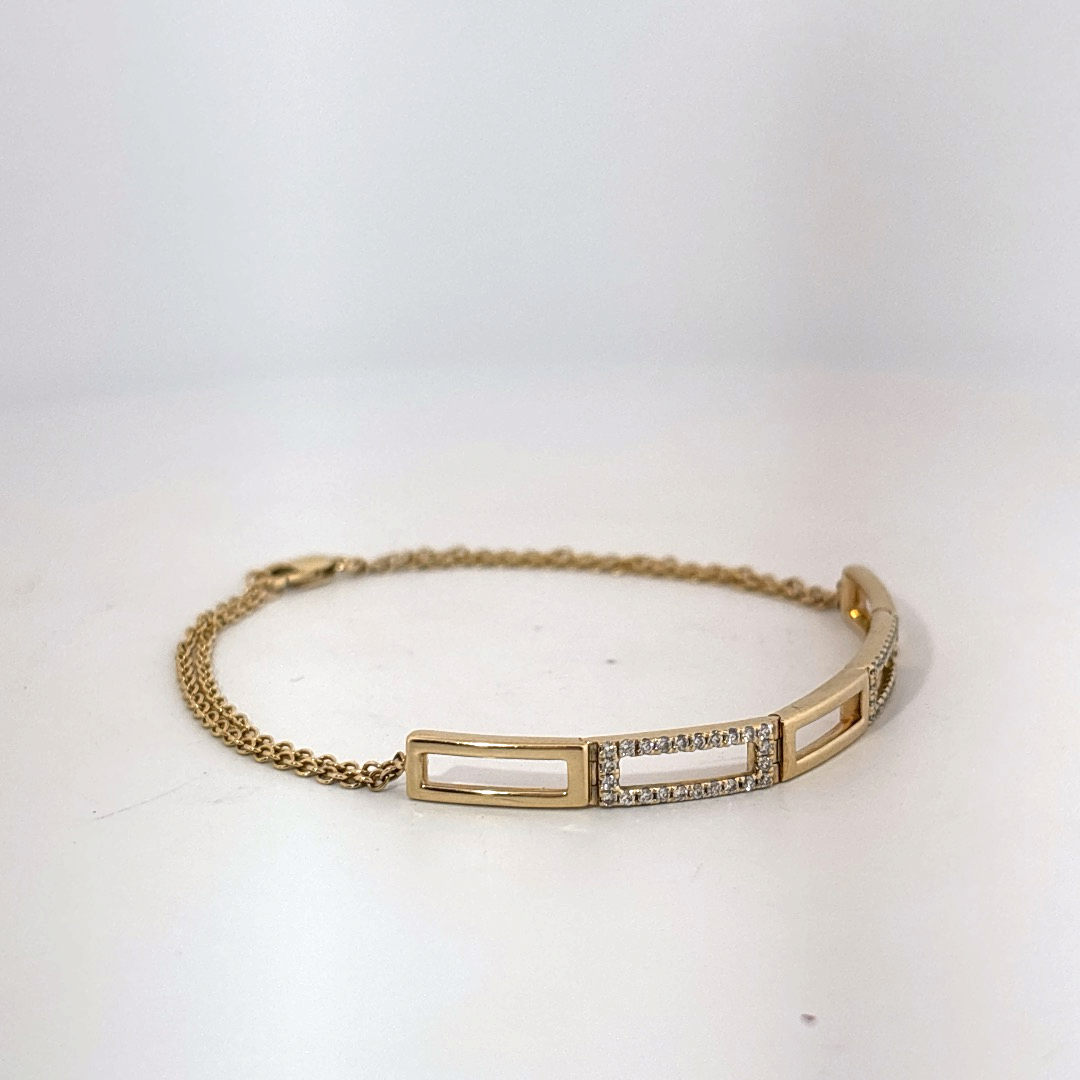 Female Geometric Bracelet, 14K Yellow Gold with diamond accents totaling 0.24ct.
