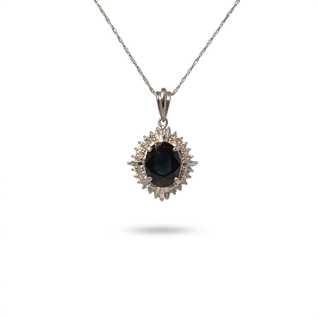 Female Sapphire Pendant Necklace, 900 Platinum, oval sapphire (2.25ct) surrounded by diamonds (0.2ct) in halo setting.