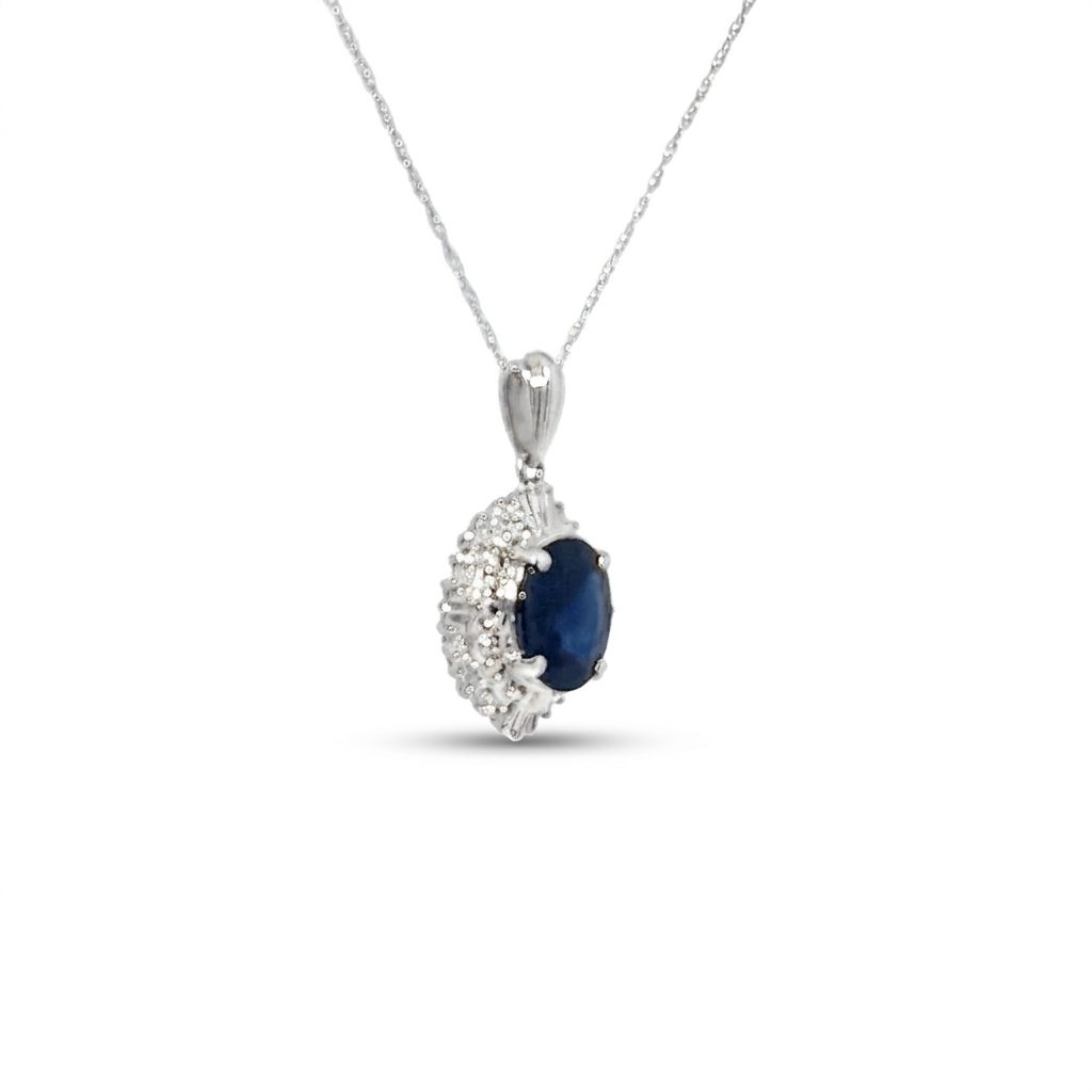 Female Sapphire Pendant Necklace, 900 Platinum, oval sapphire (2.25ct) surrounded by diamonds (0.2ct) in halo setting.