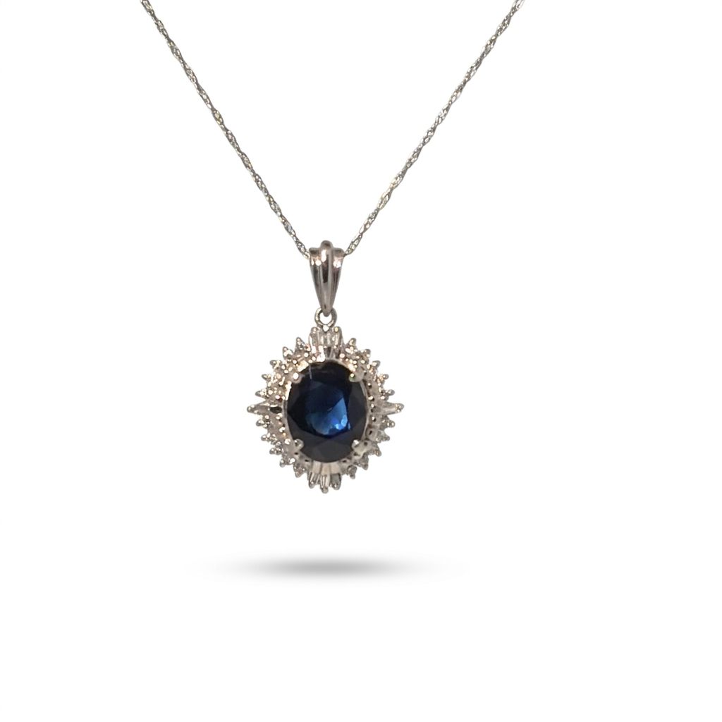Female Sapphire Pendant Necklace, 900 Platinum, oval sapphire (2.25ct) surrounded by diamonds (0.2ct) in halo setting.