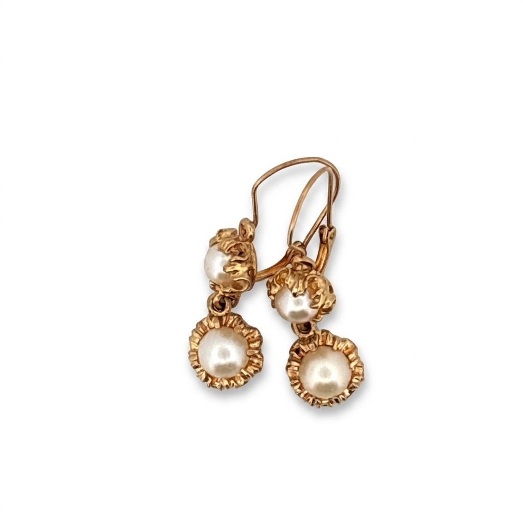 Female Earrings, 14K Yellow Gold, featuring four white Pearls in two-drop design settings.